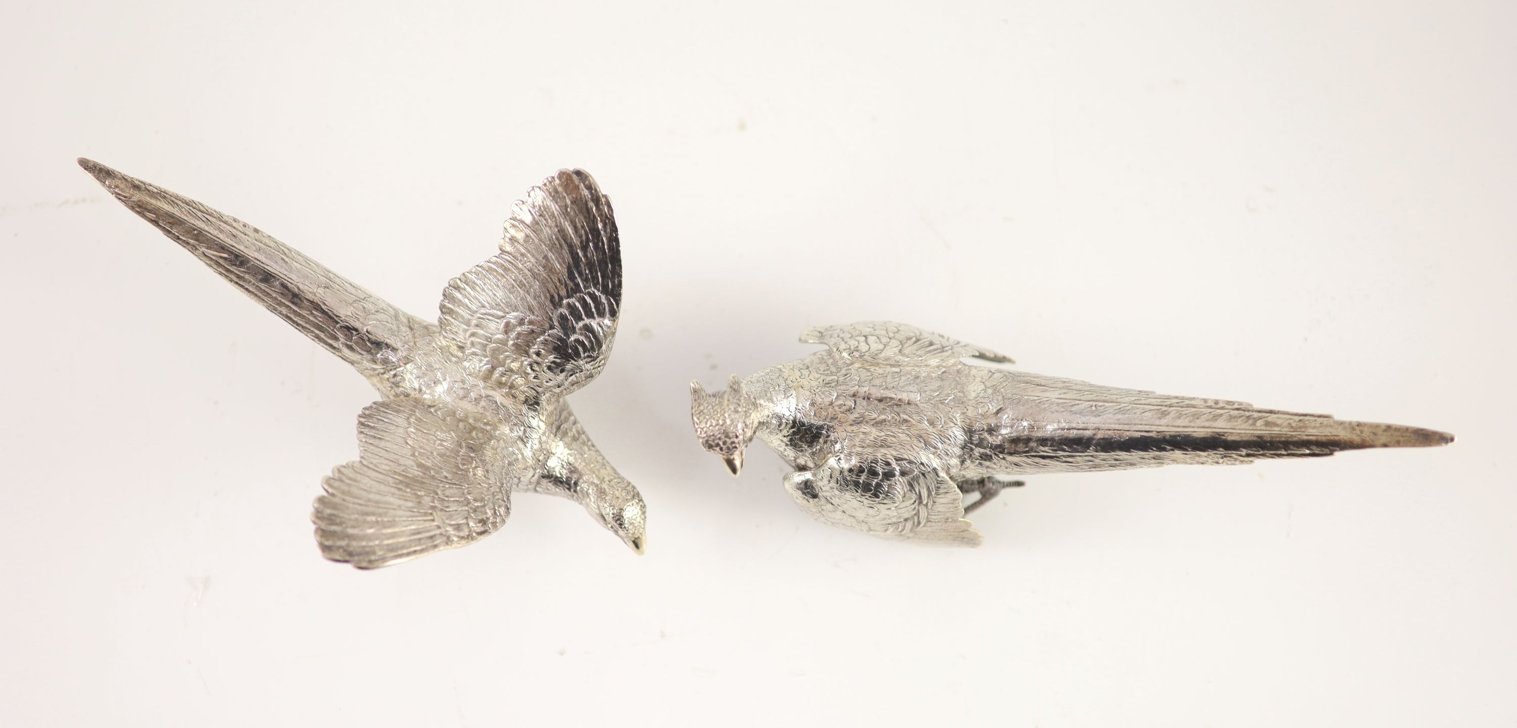 A pair of silver free standing pheasant table ornaments, by Edward Barnard & Sons Ltd,